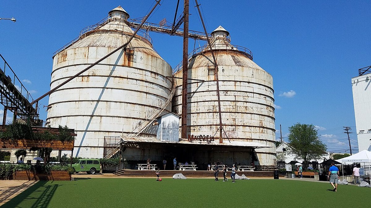 Visitors walking the lawn at Magnolia Market at the Silos in Waco, Texas