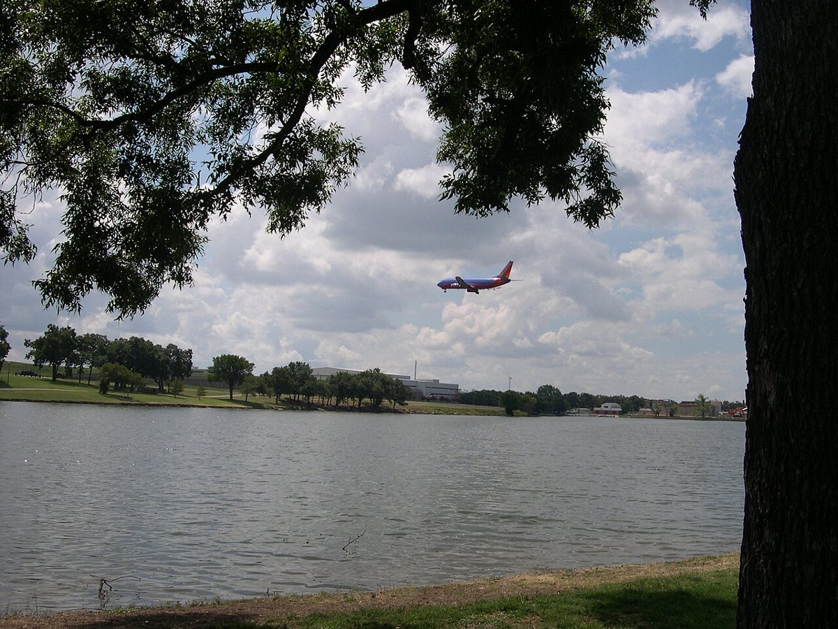 paved trail and lake view at Bachman Lake Park near Love Field